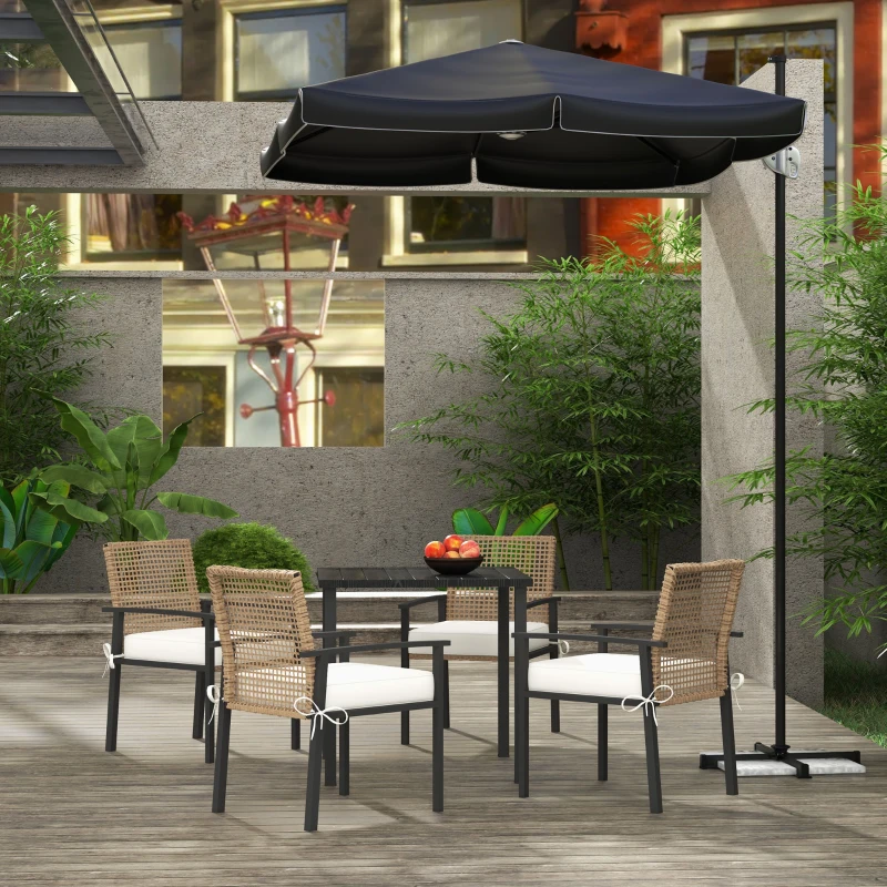 Outdoor wicker dining set with cushioned chairs and table.