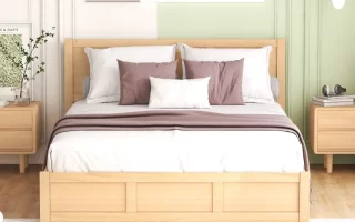 Natural wood storage bed against pastel green wall